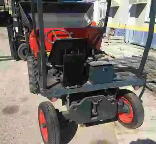 7. Dumper Agria basculante con pala Cargadora