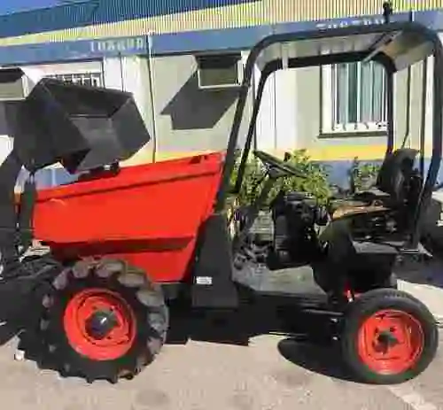 6. Dumper Agria basculante con pala Cargadora
