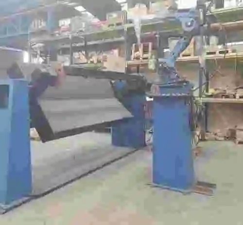 1. Robot con mesa volteadora MOTOMAN YR-HP20