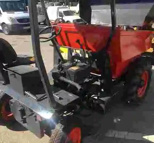 10. Dumper Agria basculante con pala Cargadora