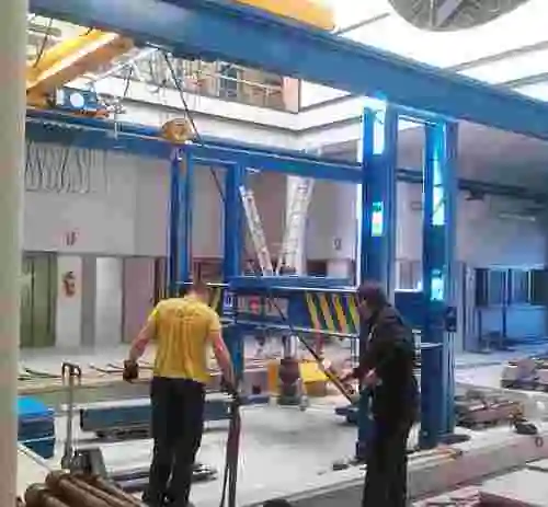 11. Prensa de 1000 TN para pruebas de compresión en tuberías de hormigón